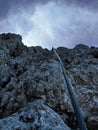via ferrata iron rope road, climbing active rest. Mountains, vertical in rocks Royalty Free Stock Photo