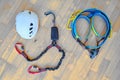 Via ferrata set: helmet, via ferrata lanyards and shock absorber, climbing harness. Top down photo of essential klettersteig gear. Royalty Free Stock Photo