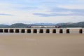 Viaduct with Train crossing the Estuary of the River Kent in Cumbria Royalty Free Stock Photo