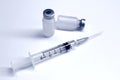 Vial of drugs or vaccine and 3 ml plastic syringe with needle isolated on the white background Royalty Free Stock Photo