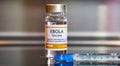 Vial of Ebola vaccine with a syringe