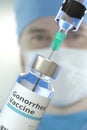 Vial with gonorrhea vaccine and syringe against blurred doctor`s face. 3D rendering