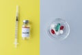 Vial with vaccine and syringe on yellow background, round plate with pills on grey background, comparison of two methods of treatm