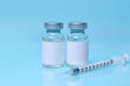 Vials with a vaccine on a blue background. Coronavirus vaccines.The concept of medicine, healthcare and science.ÃÂ¡opy space for Royalty Free Stock Photo