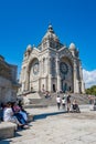 Viana do Castelo, PORTUGAL - 6 August 2021 - Perspective of the quadrangular facade of the Santa Luzia basilica with tourists Royalty Free Stock Photo