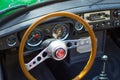 Vianden, Luxembourg; 08/12/2018: view of the steering wheel and speedometer in the interior of a MG MGB, a vintage old classic