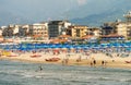 VIAREGGIO, ITALY - MAY 30, 2015: Row of beach umbrellas on private bathhouse. Viareggio is a famous destination in Tuscany Royalty Free Stock Photo