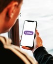 Viber on iphone in hand realistic texture
