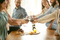 People clinking glasses with wine or champagne. Happy cheerful friends celebrate holidays, meeting. Close up shot of Royalty Free Stock Photo