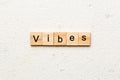 vibes word written on wood block. vibes text on table, concept Royalty Free Stock Photo