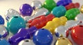 Vibrant abstract arrangement of colorful plastic beads and objects for crafts and design Royalty Free Stock Photo
