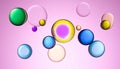 Vibrant abstract composition featuring colorful, translucent bubbles floating against a soft pink background. Royalty Free Stock Photo
