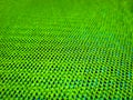 Vibrant abstract green grid pattern background