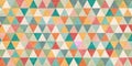 A vibrant abstract mosaic of pastel and earthy triangles forming a seamless repeating pattern ideal for design projects. Royalty Free Stock Photo