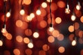 Vibrant abstract red merry christmas lights bokeh blurred background with festive holiday atmosphere Royalty Free Stock Photo