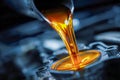 Close-up of motor oil being poured into an engine, highlighting the rich amber color and fluid dynamics within a high-performance Royalty Free Stock Photo