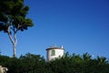 Outstanding mansion, with arch on the sea view shore at sunset Royalty Free Stock Photo