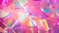 Collection of Compact Discs Scattered on a Bright Pink Surface Royalty Free Stock Photo