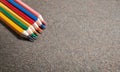 Rainbow Pencils on Textured Surface Royalty Free Stock Photo
