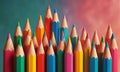 vibrant array colored pencils, in various hues, is arranged in diagonal line against gradient background. Royalty Free Stock Photo