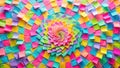 A vibrant array of colorful adhesive notes arranged in a captivating swirling pattern, creating a mesmerizing visual spectacle of Royalty Free Stock Photo