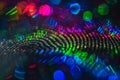 A vibrant array of colorful bokeh lights arranged in concentric patterns, creating a mesmerizing and abstract visual Royalty Free Stock Photo