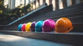 Colorful Hard Hats Sit on Stairs Outside in Afternoon Sunlight Royalty Free Stock Photo