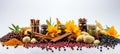 Vibrant array of colorful spices, aromatic herbs, and kitchen utensils on a pristine white backdrop Royalty Free Stock Photo