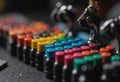 Tattoo artist's ink caps arranged neatly beside a sterilized tattoo machine Royalty Free Stock Photo