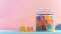 Vibrant Assorted Sugar Gummies in Glass Jar on Pastel Background Royalty Free Stock Photo