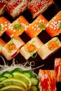 Vibrant assorted sushi rolls with salmon, eel, tuna, mamenori Royalty Free Stock Photo