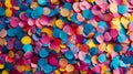 Vibrant Assortment of Colorful Confetti on White Background
