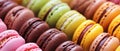 Vibrant Assortment Of Delectable Macarons In Various Hues And Flavors