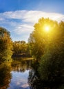 Vibrant autumn colours of the serene Serpentine River at Park,