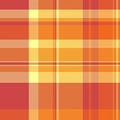 Vibrant autumnal plaid pattern in warm oranges and reds. Perfect for textile design, fallthemed projects, or creating a cozy, Royalty Free Stock Photo