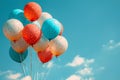 Vibrant balloons against a backdrop of a clear blue sky Royalty Free Stock Photo