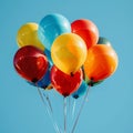 Vibrant balloons against a backdrop of a clear blue sky Royalty Free Stock Photo