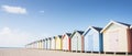 Vibrant Beach Huts Lining Sandy Shore, Creating a Captivating Coastal Scene Royalty Free Stock Photo