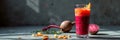 Vibrant beetroot and orange juice in glass with fresh ingredients on table Royalty Free Stock Photo