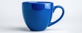 The vibrant blue ceramic mug on a clean background.AI generated image Royalty Free Stock Photo