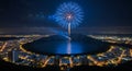 Spectacular Fireworks Display Over Lake and City at Night Royalty Free Stock Photo