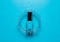 Blue nail polish bottle splashing in water splash Royalty Free Stock Photo