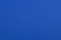 Vibrant Blue Paper Texture: Minimalist Matte Surface with Fine Grain and Subtle Gradient Depth Royalty Free Stock Photo