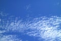 Vibrant Blue Sky with Pure White Scattered Clouds on a Sunny Day in Bangkok, Thailand Royalty Free Stock Photo