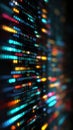 A vibrant blurred backdrop of colorful code lines and binary numbers on a computer screen, complemented by neon lights Royalty Free Stock Photo