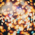 A vibrant bokeh effect displaying an array of blurred lights in circular shapes. The Royalty Free Stock Photo