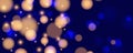 Vibrant bokeh lights. Festive abstract blurred background. Bright defocused glowing lights effect.