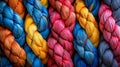 Vibrant braided ropes symbolizing teamwork and unity through intricate patterns.