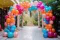 A vibrant bunch of balloons soaring through the air, creating a joyous scene against a backdrop of clear blue sky, A balloon Royalty Free Stock Photo