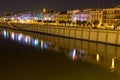 Calle Betis with reflections in the river